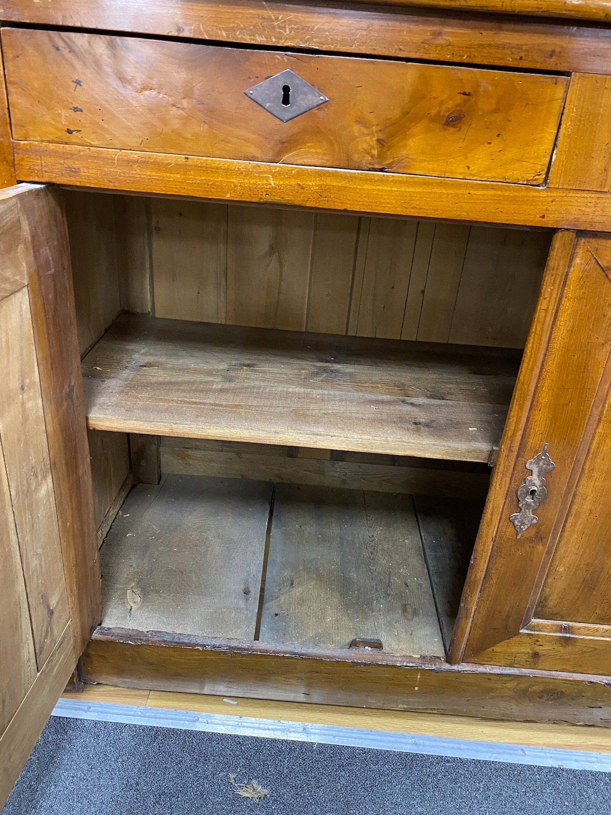 A mid 19th century French fruitwood side cabinet, width 128cm, depth 52cm, height 96cm